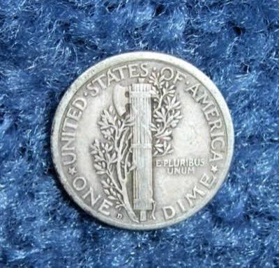 1921 Mercury Dime off-center strike error showing shifted design with blank crescent area at coin edge